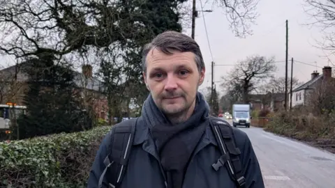 Stafford Borough Councillor Alec Sandiford on Stallington Road just next to the site where work is being carried out. 