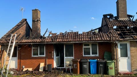 Harrogate Court in Corby with roofs destroyed by fire damage
