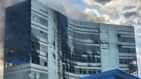 Andrei Vorobyov Smoke billows from a burning administrative building in Fryazino in the Moscow Region, Russia June 24, 2024. 