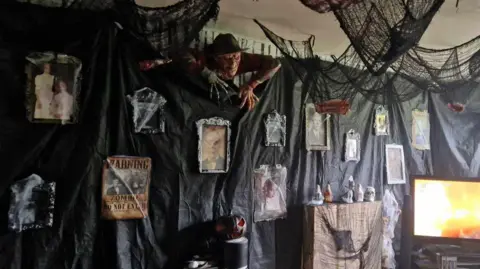 Suffolk's Scariest House A front room decorated with Halloween props