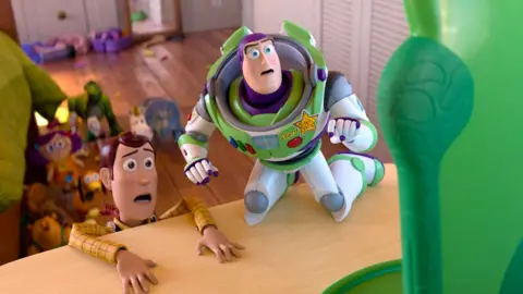 Woody and Buzz Lightyear looking scared of the digital tablet known as Lilypad