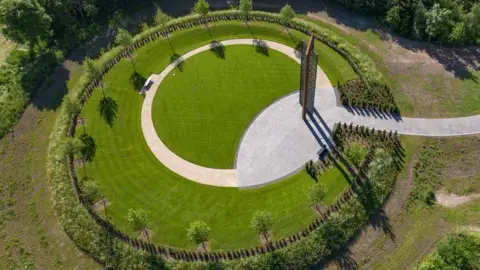 National Memorial Arboretum Police memorial, showing column and grass circle with circular path