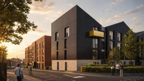 An artist's visualisation of a housing development. There are angular black buildings viewed from a road junction with give way markings. Features on the black buildings include two yellow-banded balconies either side and a number of windows. The structures have pointed roofs, and there is a further brick building in the distance.