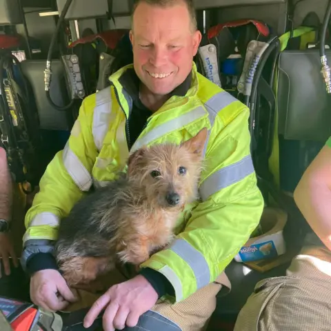 Helston Community Fire Station man and dog