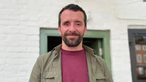 Daniel Taylor who is bar worker at the Greyhound pub on Friar Gate