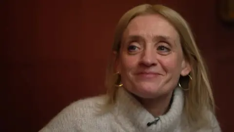 Anne-Marie Duff wearing a turtleneck jumper