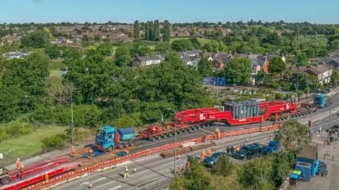 An aerial image of the abnormal load being moved