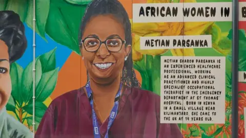 Andy Keate Portion of mural showing Metian Parskanka on vibrant background with her story written