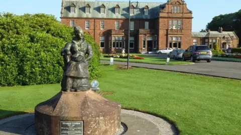 Philip Halling A statue of Elizabeth Crichton on the Crichton Estate it is on lawns in front of an impressive sandstone building