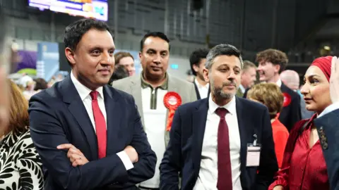 Scottish Labour leader Anas Sarwar (left) at Glasgow International Arena for the 2026 Holyrood elections