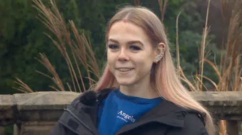 BBC A girl pictured, smiling