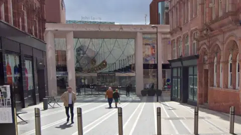 Google An exterior image of one of the entrances to Victoria Gate shopping centre in Leeds.