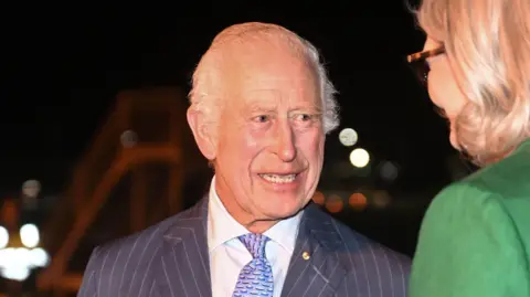 King Charles arriving at the airport in Sydney Australia where he was greeted by the governor general