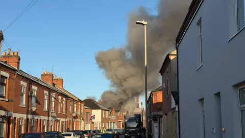 Leicester Media Online Smoke billowing from a fire at Klassic shop on Marjorie Street in Leicester
