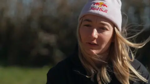 Tahnee Seagrave wearing a hat during an interview