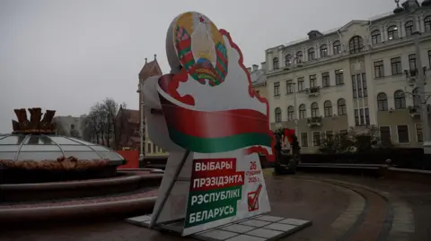 An election advertisement in green, red and blue in Minsk. No particular candidate is promoted, but it reminds citizens to vote only on 26 January.