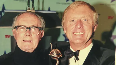 Chris Tarrant Basil Tarrant (left) and Chris Tarrant
