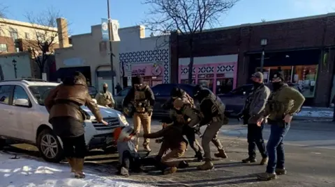 Reuters Screengrab from a video obtained by Reuters shows a law enforcement officer pinning down a man identified as Alex Pretti, before he was fatally shot when federal agents were trying to detain him in Minneapolis, Minnesota, U.S., January 24,