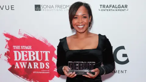 Getty Images Azuka Oforka poses in the winners room at The Stage Debut Awards 2024 in London after winning the Best Writer Award.