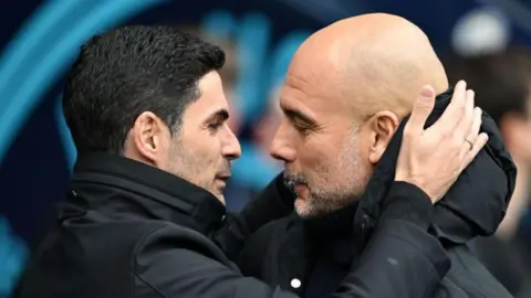 Pep Guardiola and Mikel Arteta