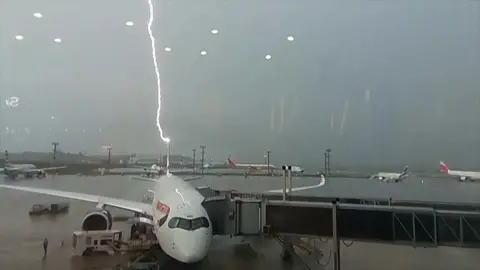 Lightning strikes parked plane in Brazil