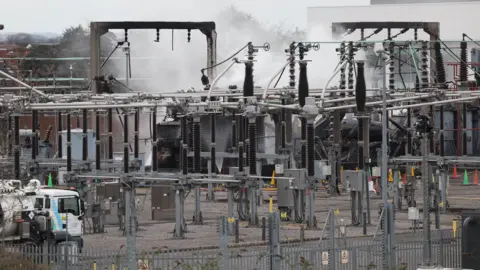 EPA Smoke billows from the North Hyde Electricity Substation in Haye