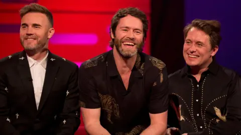 PA Media Gary Barlow, Howard Donald and Mark Owen on The Graham Norton Show in 2017