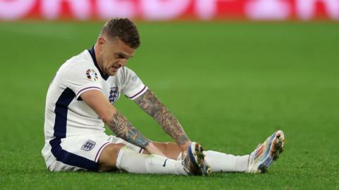 England's Kieran Trippier goes down with cramp