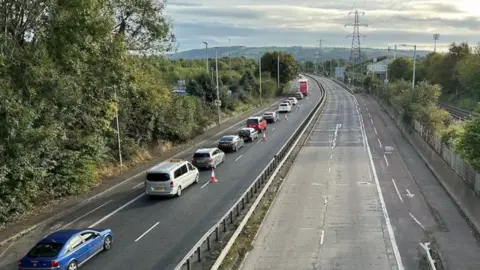 Pacemaker The Sydenham Bypass during its closure in October. There is one lane of traffic in the Bangor bound lane and a line of traffic cones blocking the outer lane. The Belfast bound lanes are empty.