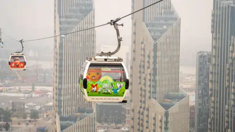 PA Media A Pokémon characters on the cable car