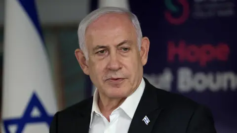 Benjamin Netanyahu speaks at the Sheba Medical Centre in Ramat Gan, Israel (8 June 2024)