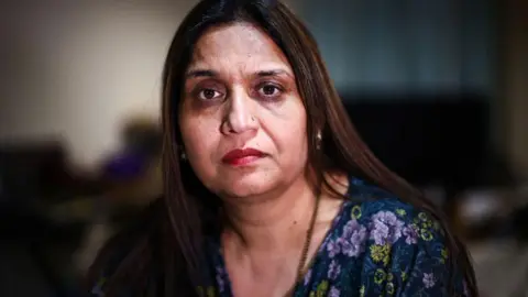 Seema Misra, a sub-postmistress who was wrongly jailed as a result of a fault IT system