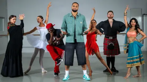 PinPep A group of dancers of multiple styles with Ashley Banjo standing in the middle with a grin on his face