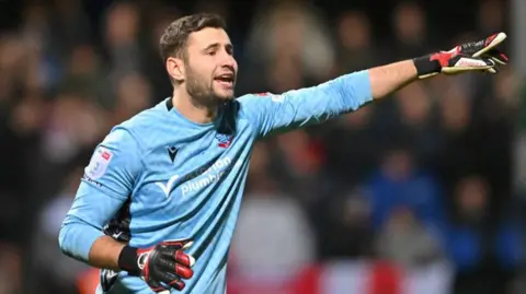 Nathan Baxter in action for Bolton Wanderers