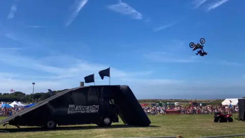 Motor cross performers