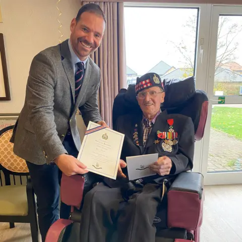 KOSB Douglas Baldwin with his birthday gift from the KOSB Association.