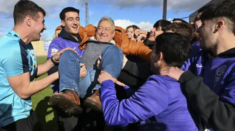 EPA Members of La Baneza Football Club team celebrate winning the first prize of El Gordo Lottery, 79,432, in the town of La Baneza, Leon province, Spain, 22 December 2025.