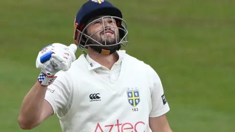 Ollie Robinson celebrates scoring century