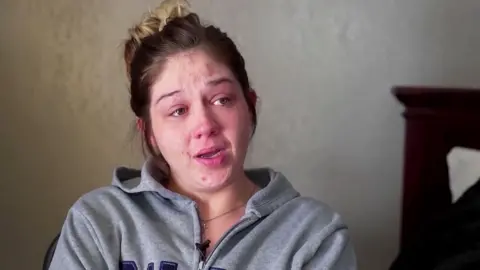 KTVT/CBS News Texas A screengrab of an interview with Hangaman, who looks visibly upset, looking to the left side of the shot