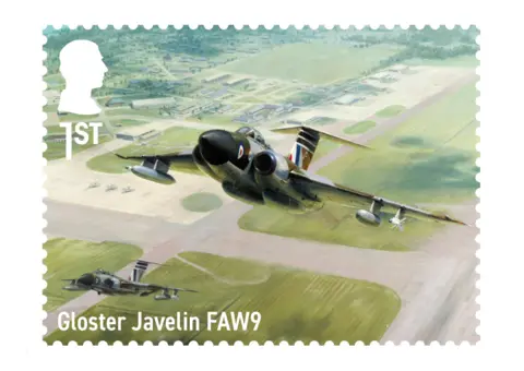 Royal Mail The stamp is labelled Gloster Javelin FAW9, with serrated edges, the King's head silhouette and a "1st Class" indicator. Stylised colour picture of a fighter jet soaring through the sky with RAF livery. 