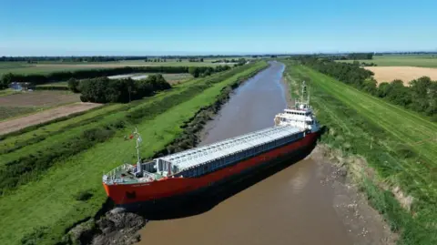 Steve Hubbard/BBC Ship wedged in river