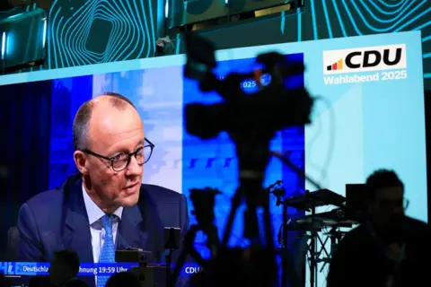 Getty Images Germany's new Chancellor Friedrich Merz at his party's election night event in Berlin