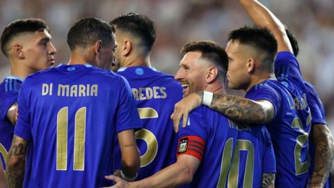 Lionel Messi celebrates with his Argentina team-mates