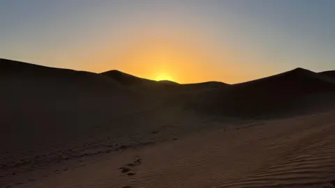 Sarah Dawson Sand landscape with a sunset