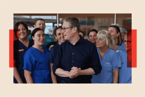 Getty Images Sir Keir Starmer poses with staff as he visits Bassetlaw Hospital Nottinghamshire on 15 June 2024 in Worksop, England.
