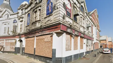 The Picture House in Castleford, a derelict boarded-up building dating from the 1920s.
