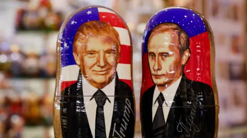 EPA Traditional Russian dolls of Presidents Trump and Putin on display at a gift shop in Moscow, 6 November 2024