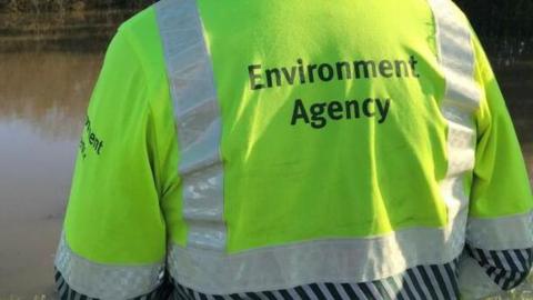 Person wearing an Environment Agency jacket