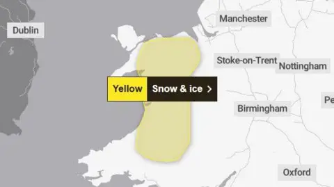 Met Office Met office map showing wales with a yellow area covering parts of north mid and south wales labelled with the words Yellow snow and ice
