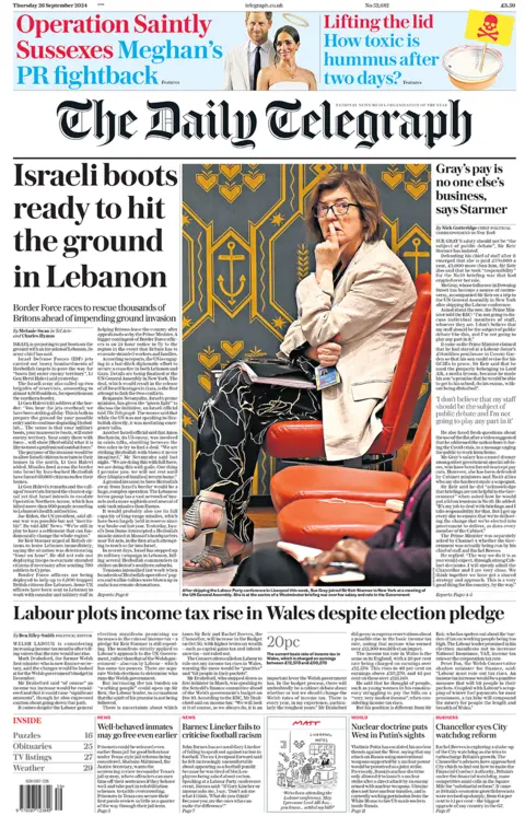 The front page of the Daily Telegraph. The headline reads: 'Israeli boots ready to hit the ground in Lebanon'.